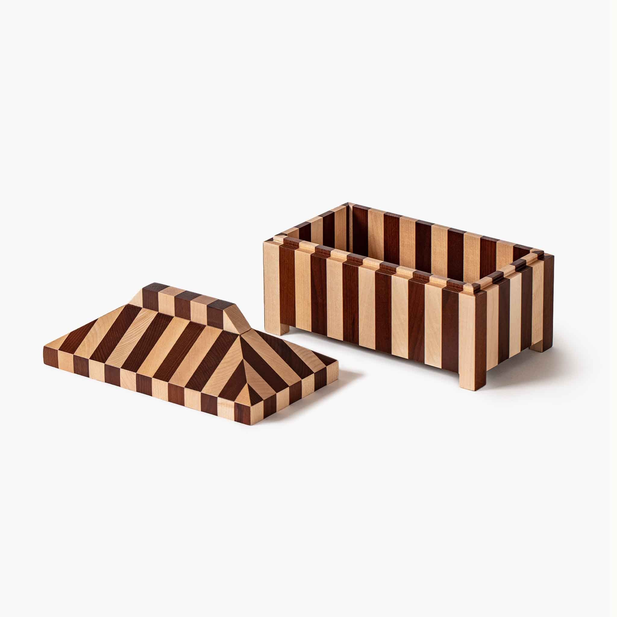 Open geometric wooden keepsake box with seamless striped interior pattern