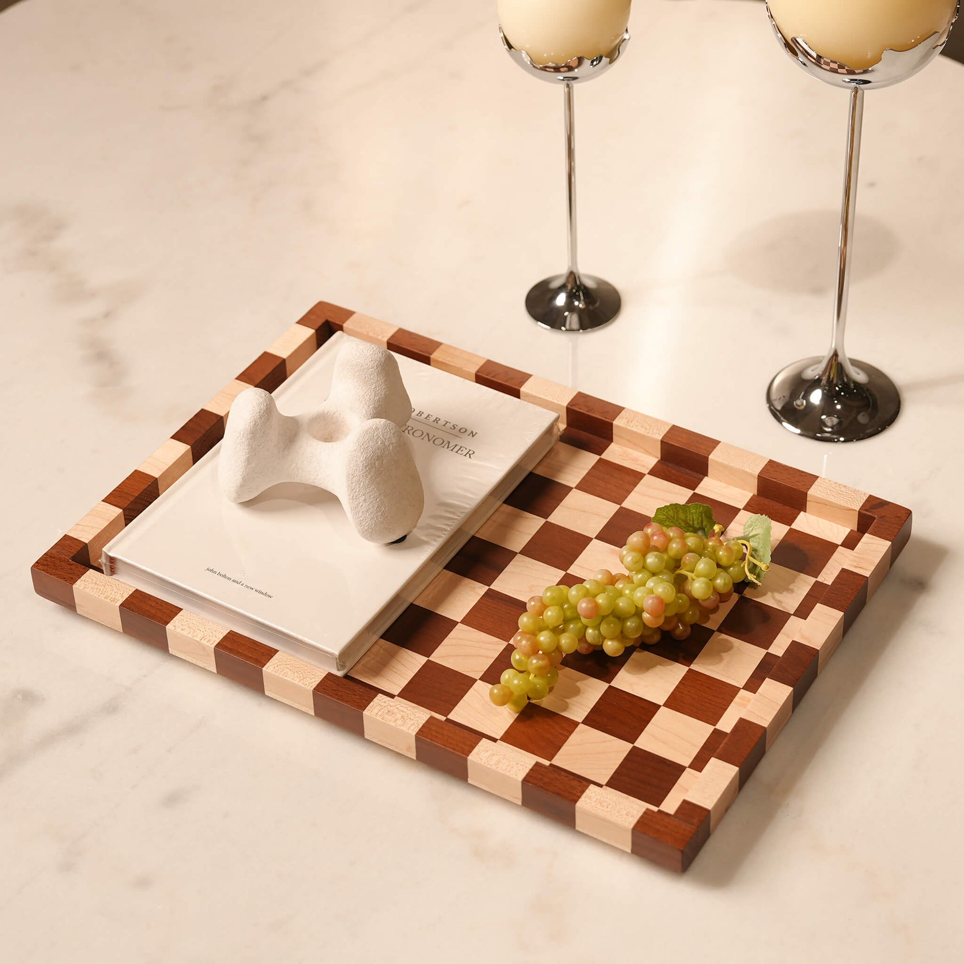 Minimalist coffee table tray adding warmth and a striking visual rhythm to a modern European interior