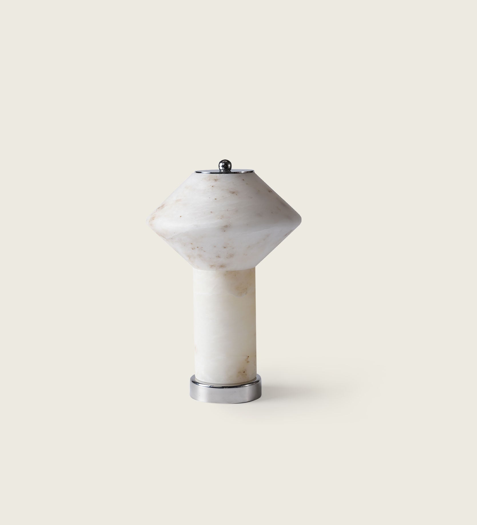 Seamlessly blending into a modern organic interior, the artamore cordless marble table lamp offers portable, elegant illumination without the clutter of wires.