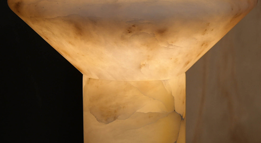 Illuminating with a soothing color temperature, the artamore rechargeable marble lamp transforms raw stone into a beacon of warmth and relaxation.