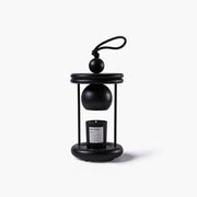Frontal profile of the Dawn smart candle warmer lamp highlighting its clock tower architectural inspiration.