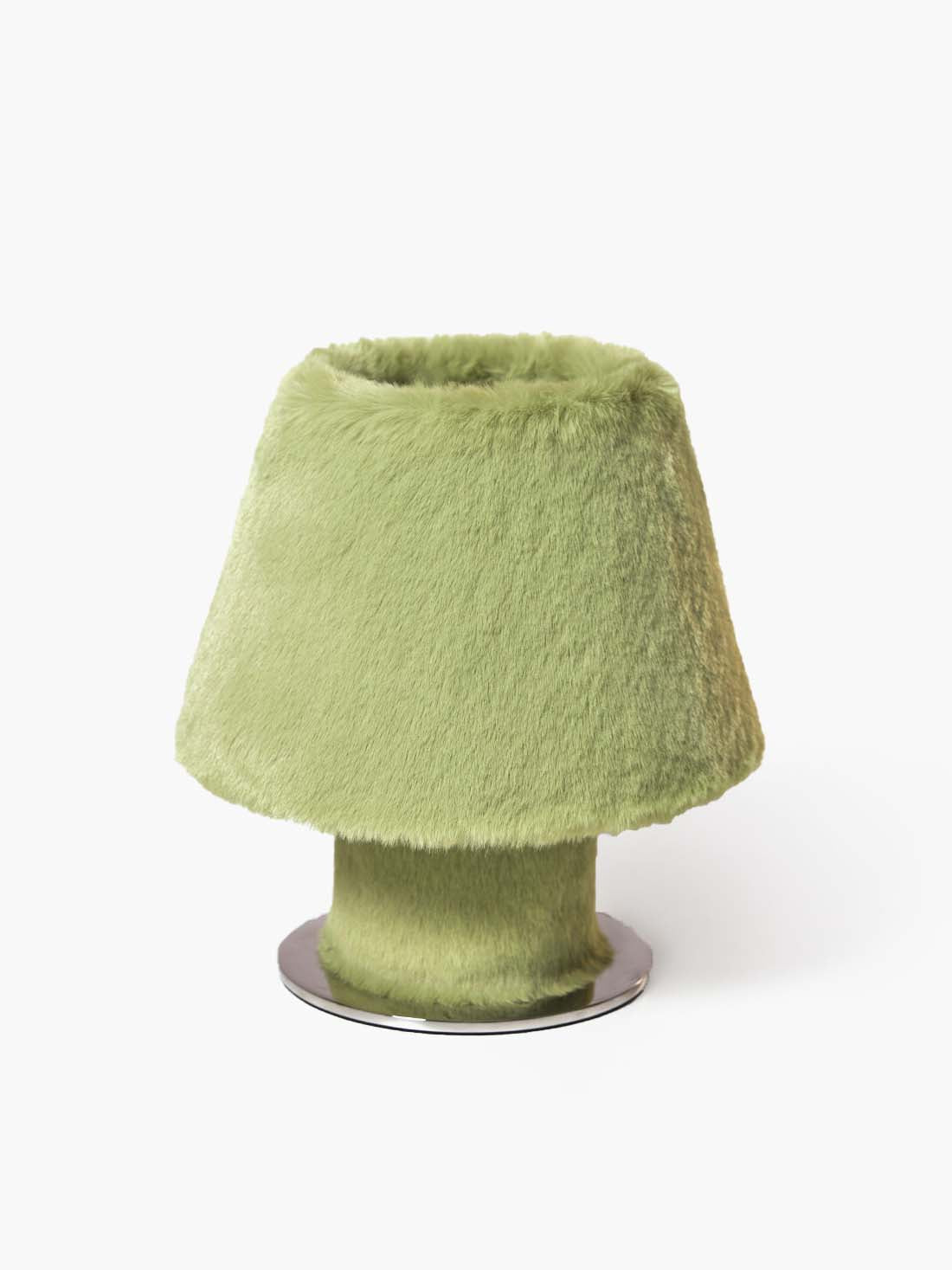 Essential designer lighting and ambient lamps creating a timeless, quiet luxury atmosphere in modern organic spaces.