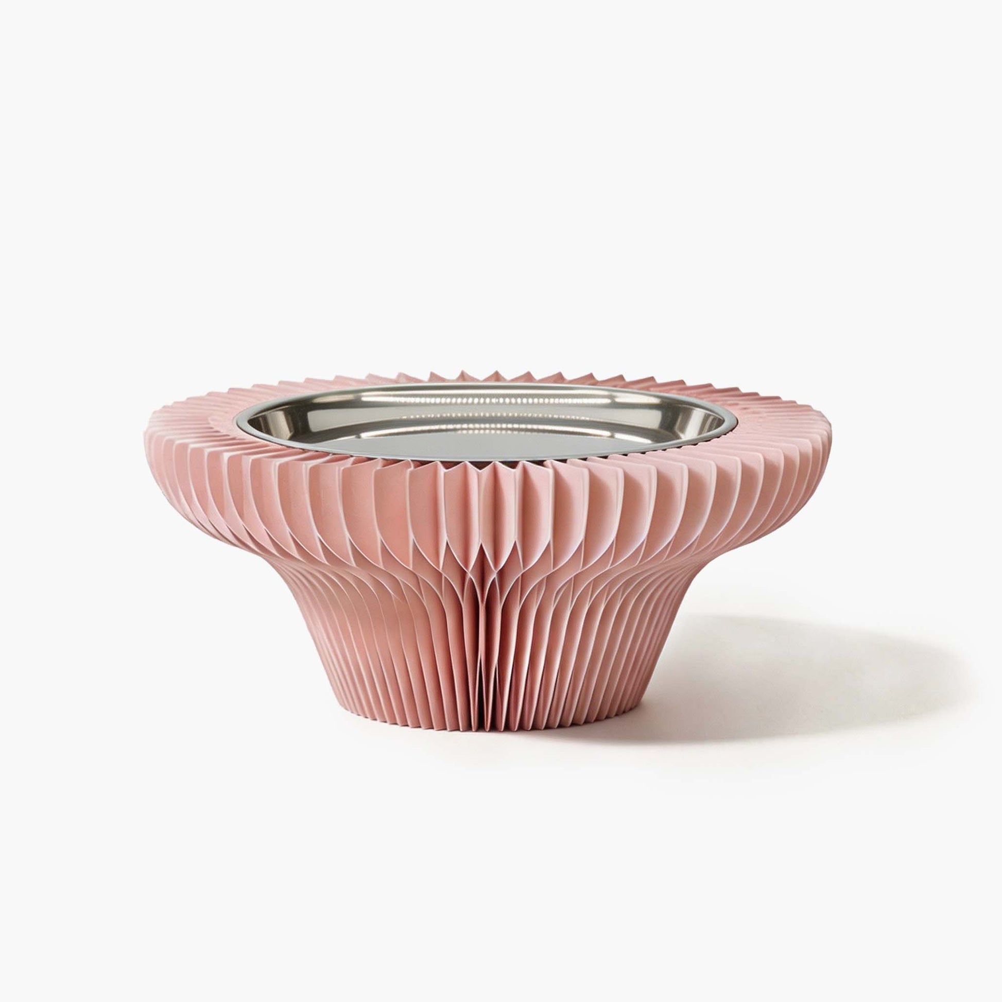 Exclusive pink elevated honeycomb paper display stand for curating modern jewelry and daily essentials.