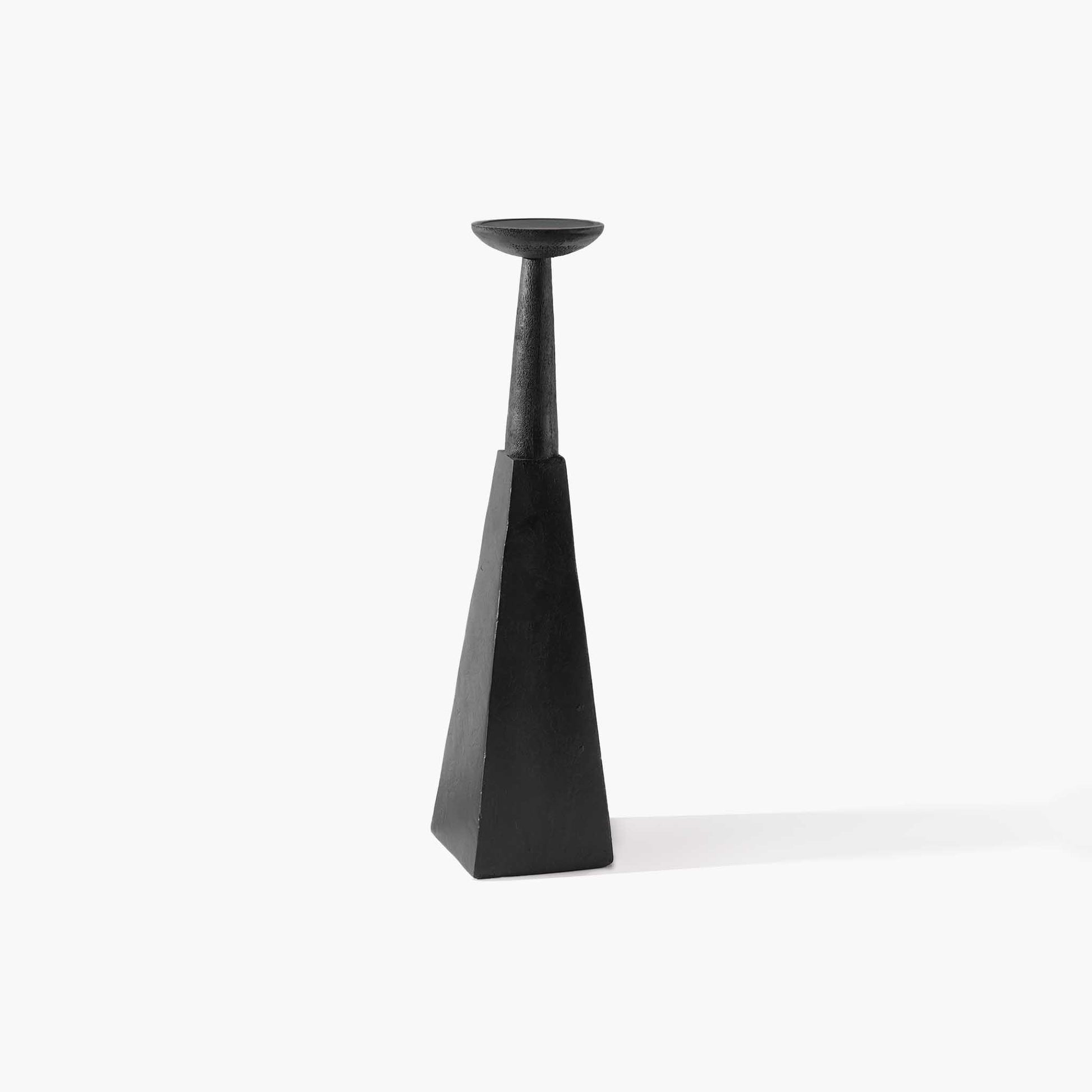 Small geometric carbonized wood floor candle holder showcasing natural wood grain