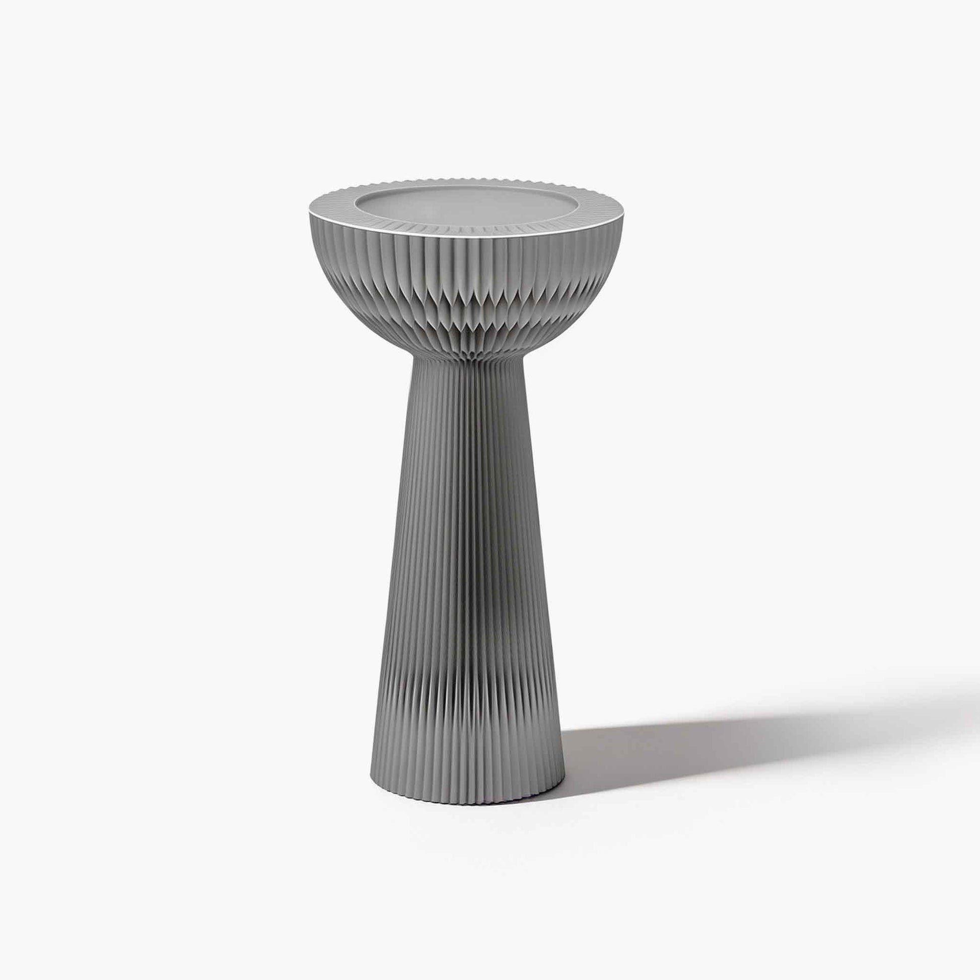 Sliver elegant hollow storage centerpiece stand showcasing dual-styling capability for quiet luxury spaces.