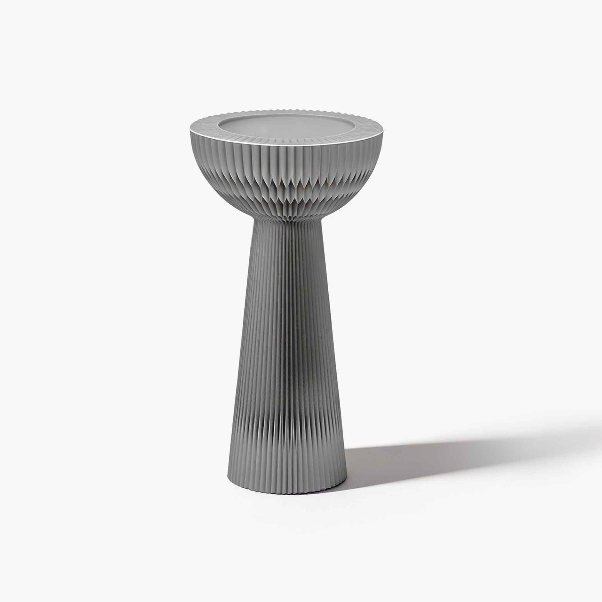 Sliver elegant hollow storage centerpiece stand showcasing dual-styling capability for quiet luxury spaces.