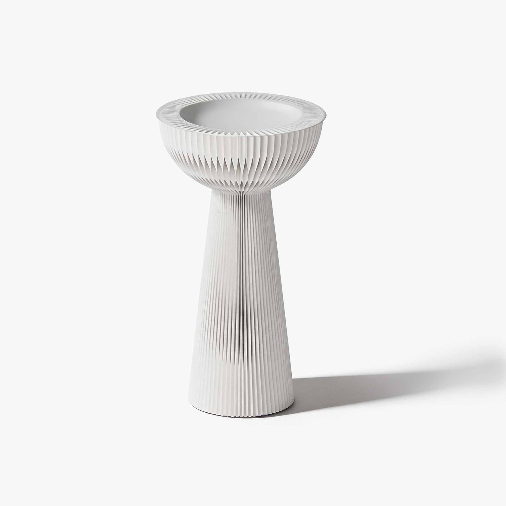 Minimalist white grand bouquet accordion side table with frosted acrylic top for an elegant foyer setup.