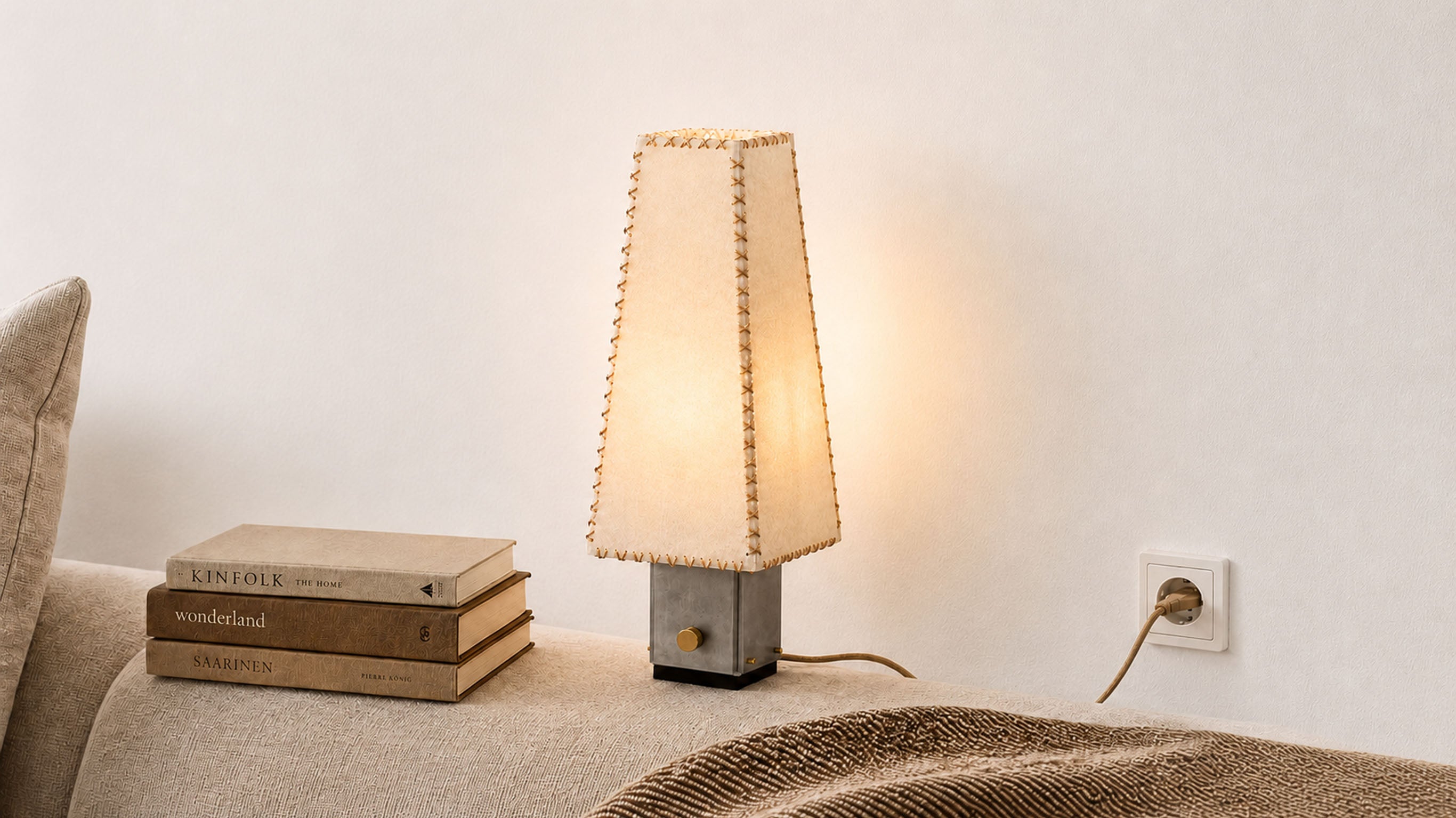 A close-up look at the artamore parchment lamp, emphasizing the artisan hand-folded details and the time-worn vintage texture of the lampshade.
