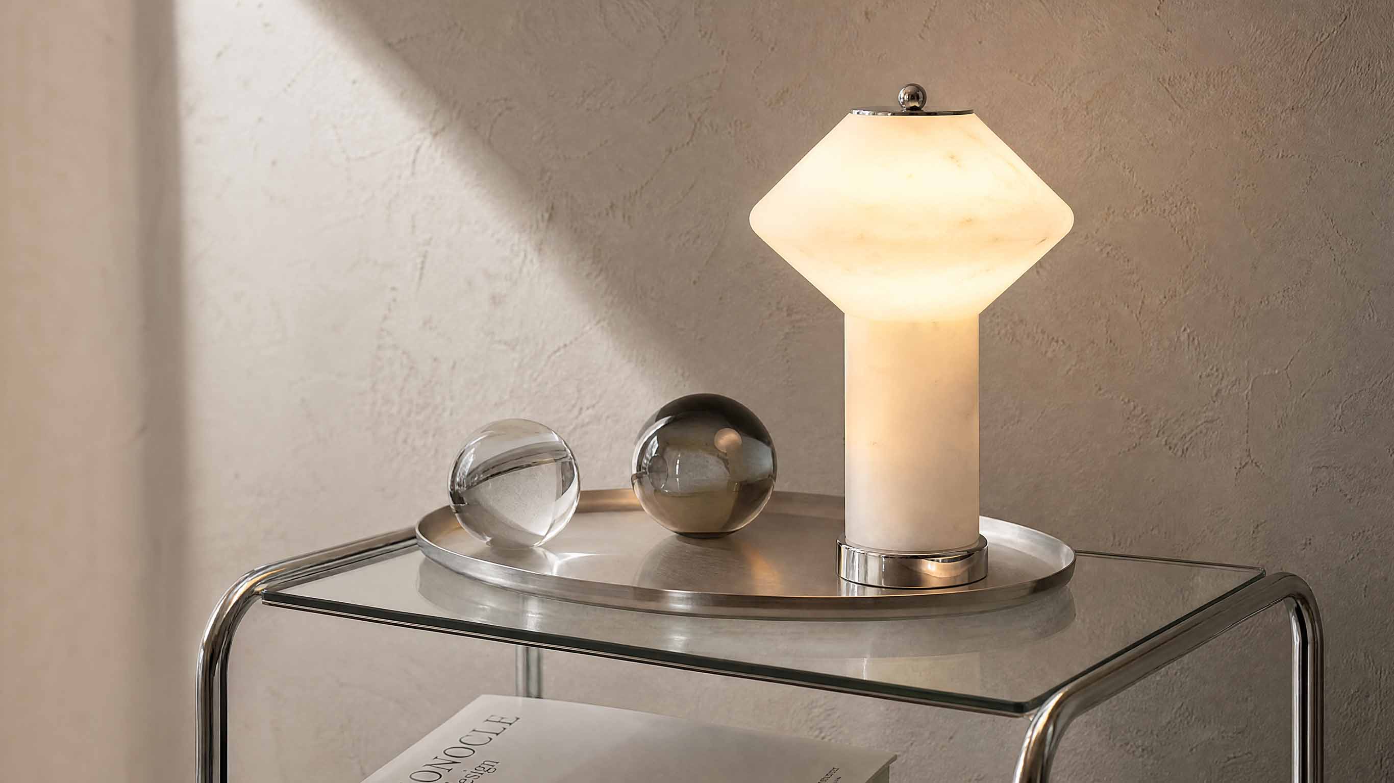 A close-up of the artamore natural marble lamp highlighting the unique, one-of-a-kind stone veining that embodies the wabi-sabi philosophy of natural beauty.