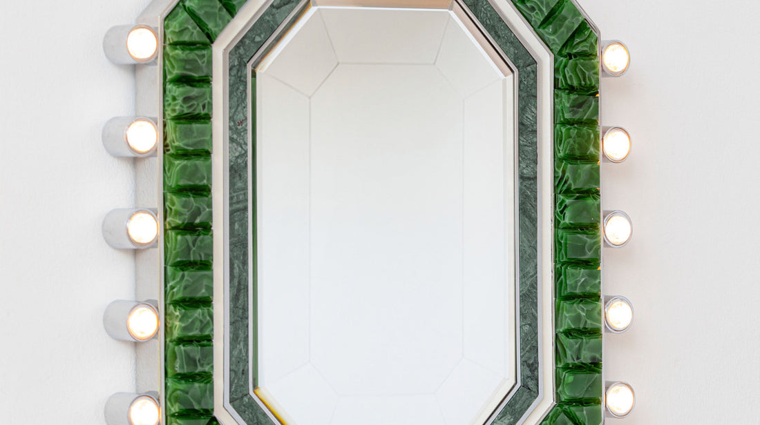 Close-up detail of the ARTAMORE Nobility Mirror, revealing the traditional jade-polishing processes that give the recycled glass its emerald luster.