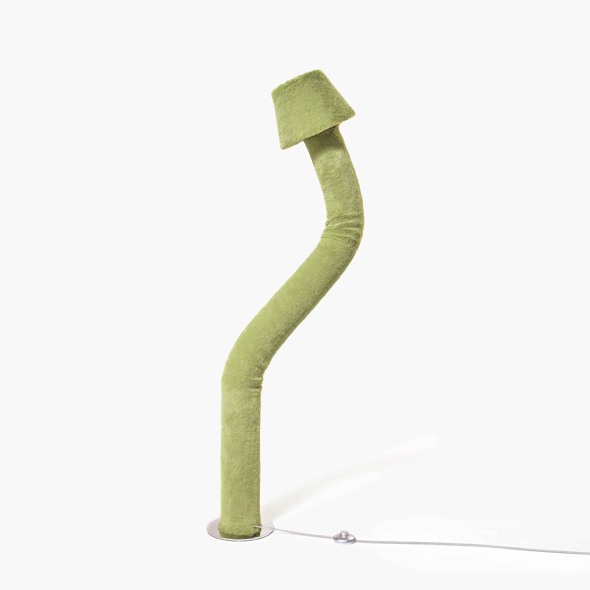Exclusive pine green plush flexible floor lamp curving beautifully in a minimalist living room setting.