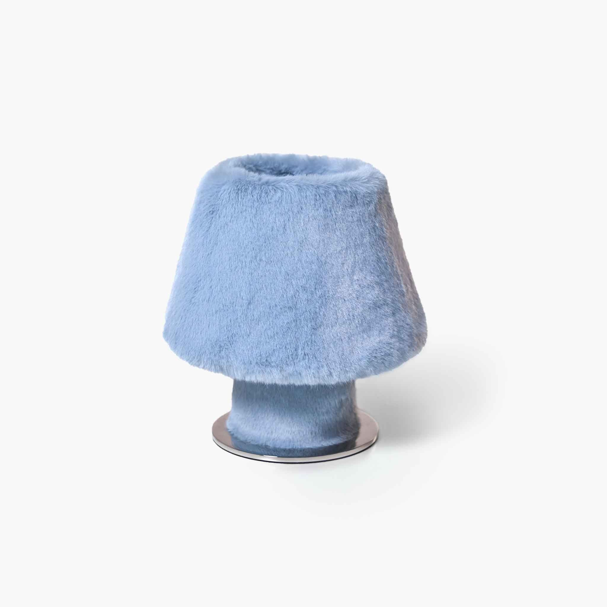 Blue eco-friendly fluffy bedside lamp showcasing a timeless silhouette and tactile softness.