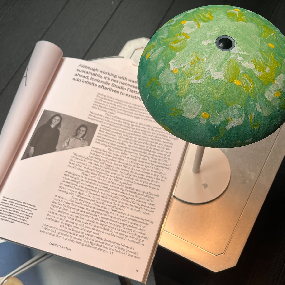 Close-up of a green floral Relax-W lamp shade showing its hand-painted textured DIY micro-cement finish.
