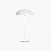 White Relax-W desk lamp with micro-cement base and DIY painting tools for unique artistic curation.