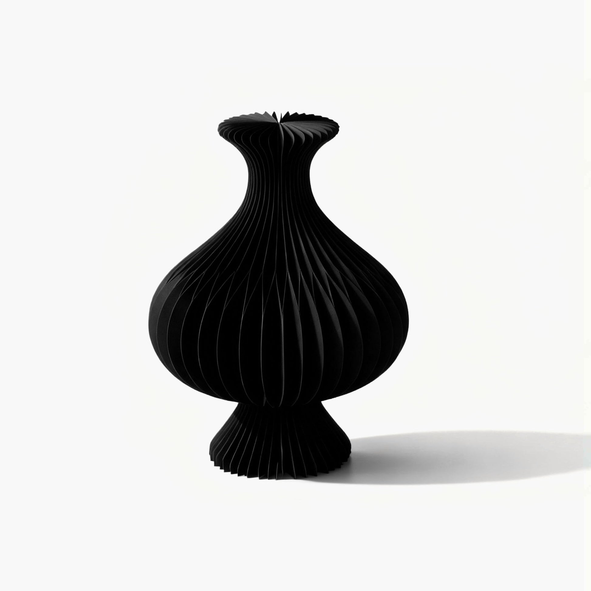Exclusive black small accordion paper vase showcasing timeless geometric beauty for a modern organic home setup.