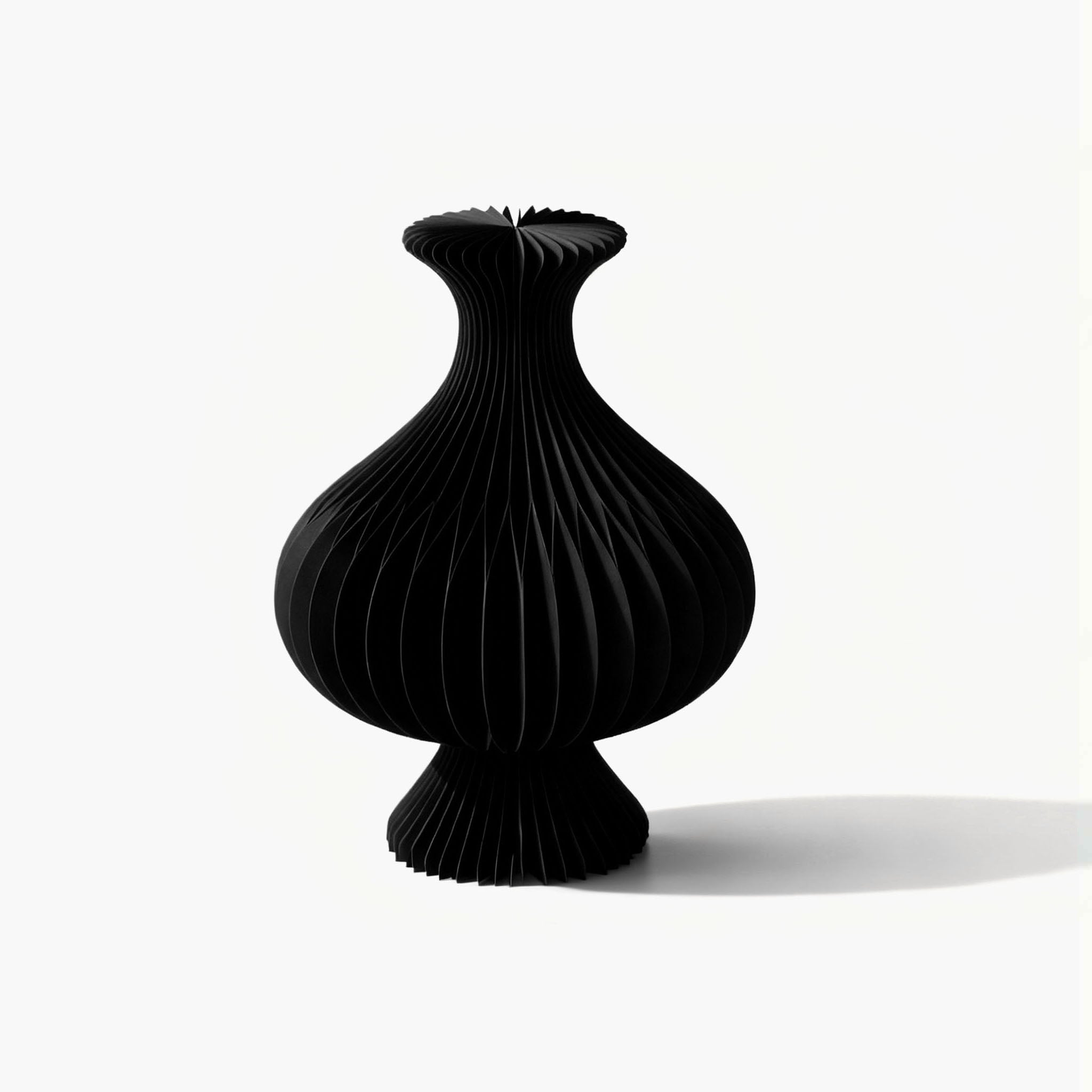 Exclusive black small accordion paper vase showcasing timeless geometric beauty for a modern organic home setup.