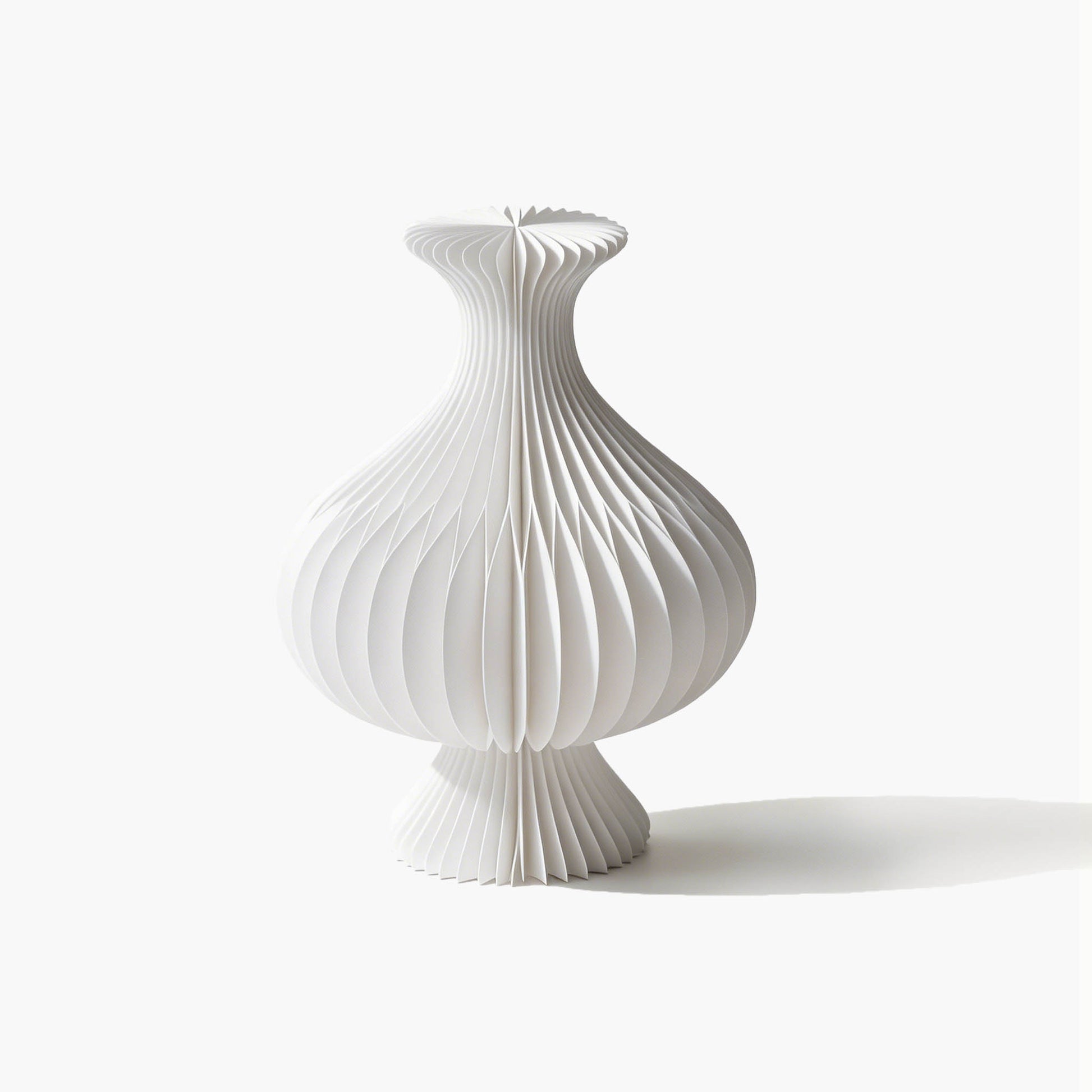 Elegant white short foldable paper vase featuring a versatile acrylic container for effortless floral arrangements.