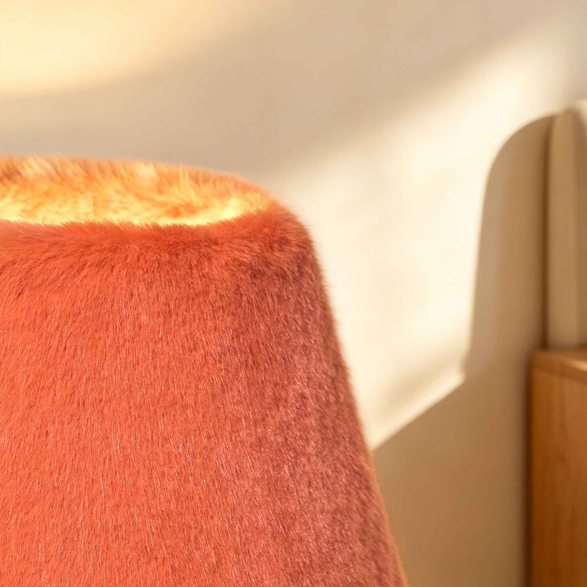 Tactile faux fur material glowing under warm modern illumination