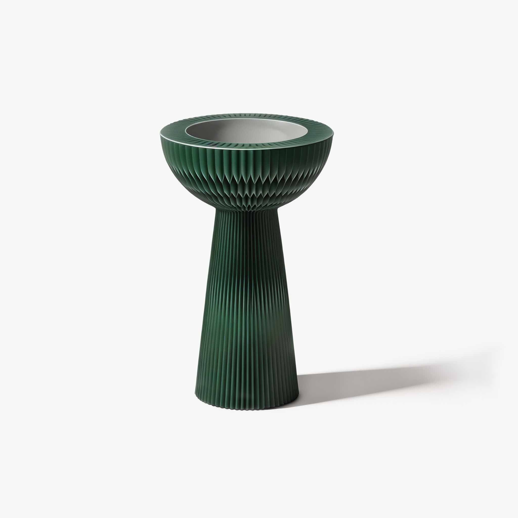 Pine green elevated foldable kraft paper end table curating a warm modern organic atmosphere in the lounge.