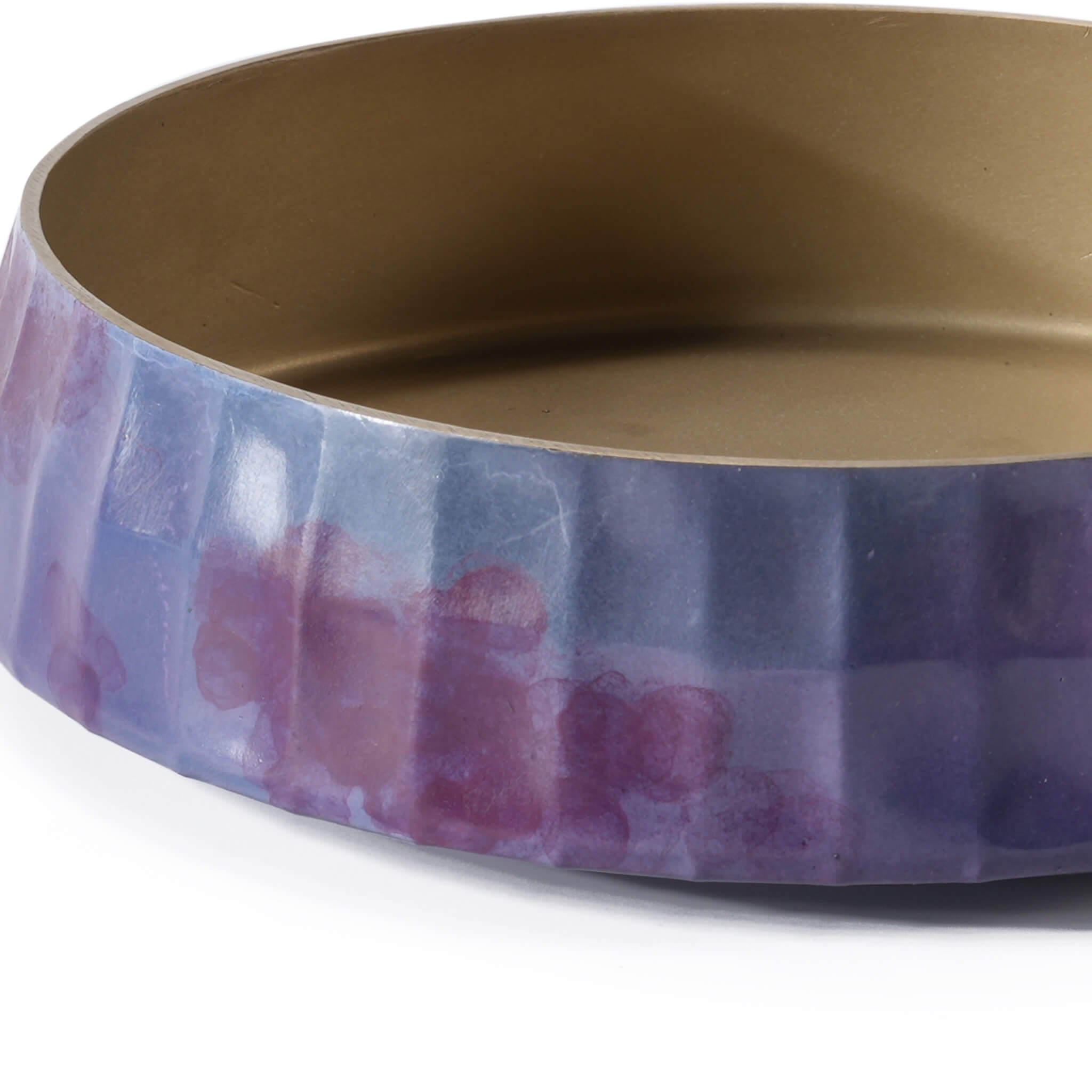 Close-up detail of the purple brass Ikebana bowl , highlighting the raw warmth of the original brass interior and artisanal texture