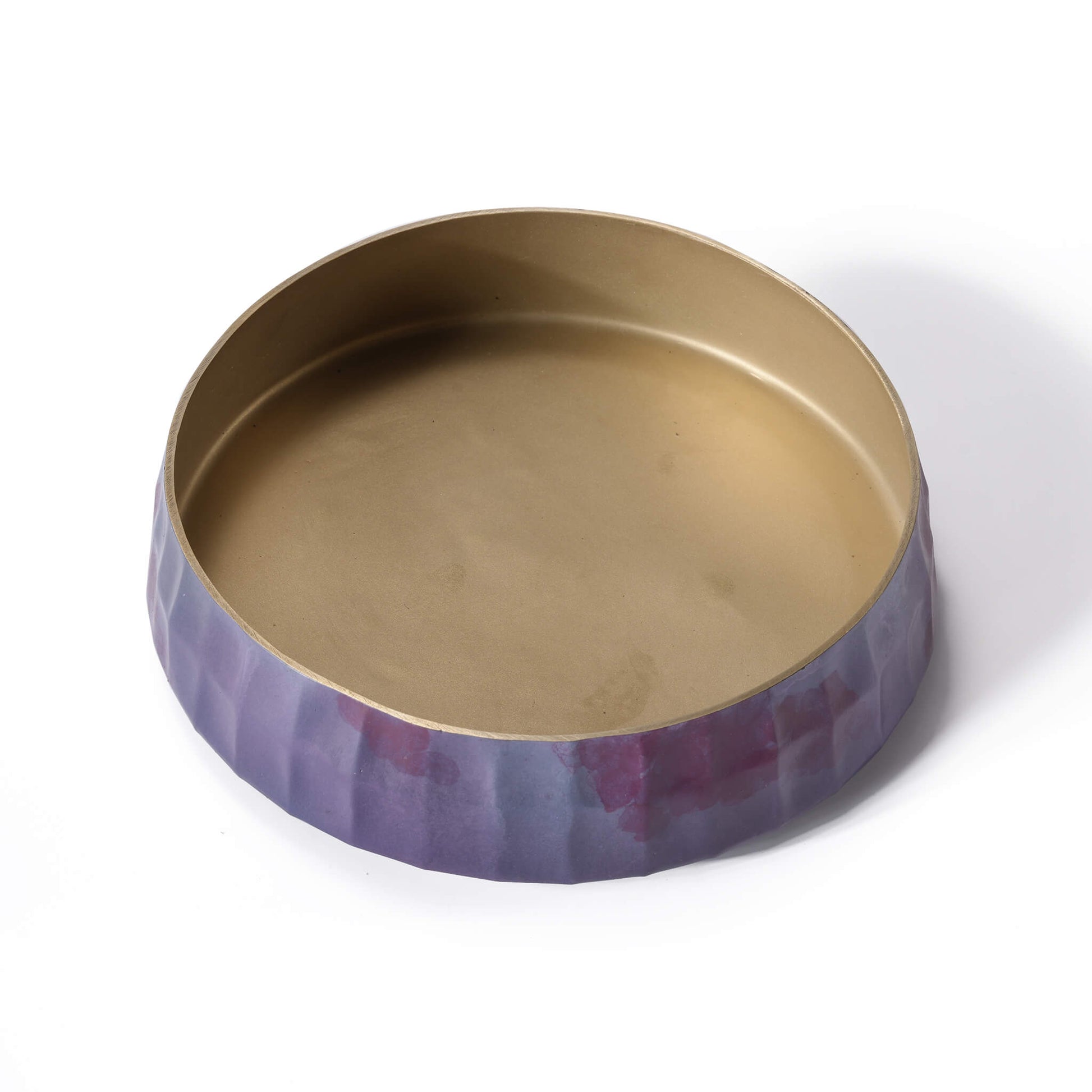Top-down angle of the solid brass floral bowl , revealing the tapered mouth design and the luxurious raw brass interior