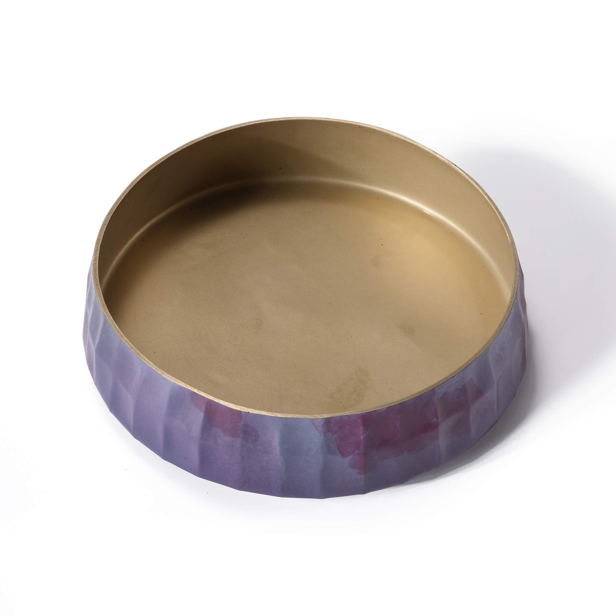 Top-down angle of the solid brass floral bowl , revealing the tapered mouth design and the luxurious raw brass interior