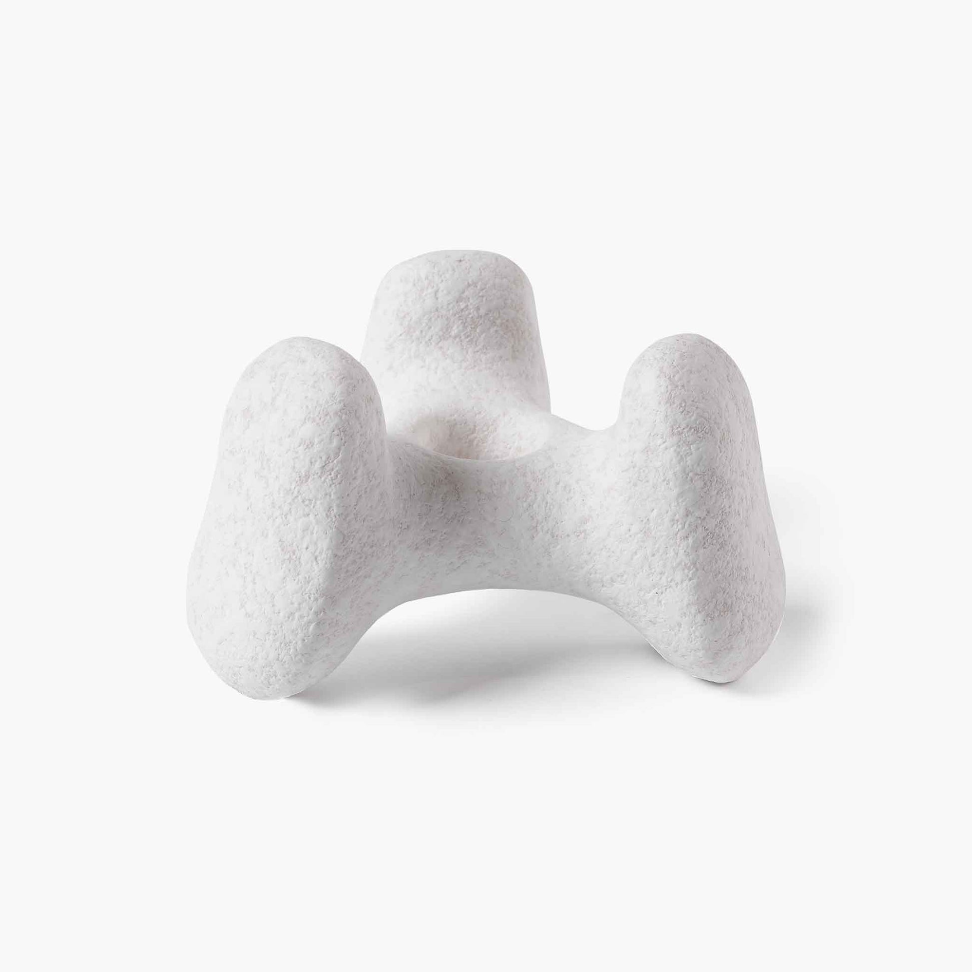 Minimalist sculptural ceramic tray featuring a wabi-sabi tactile finish, an essential art piece for elegant styling.