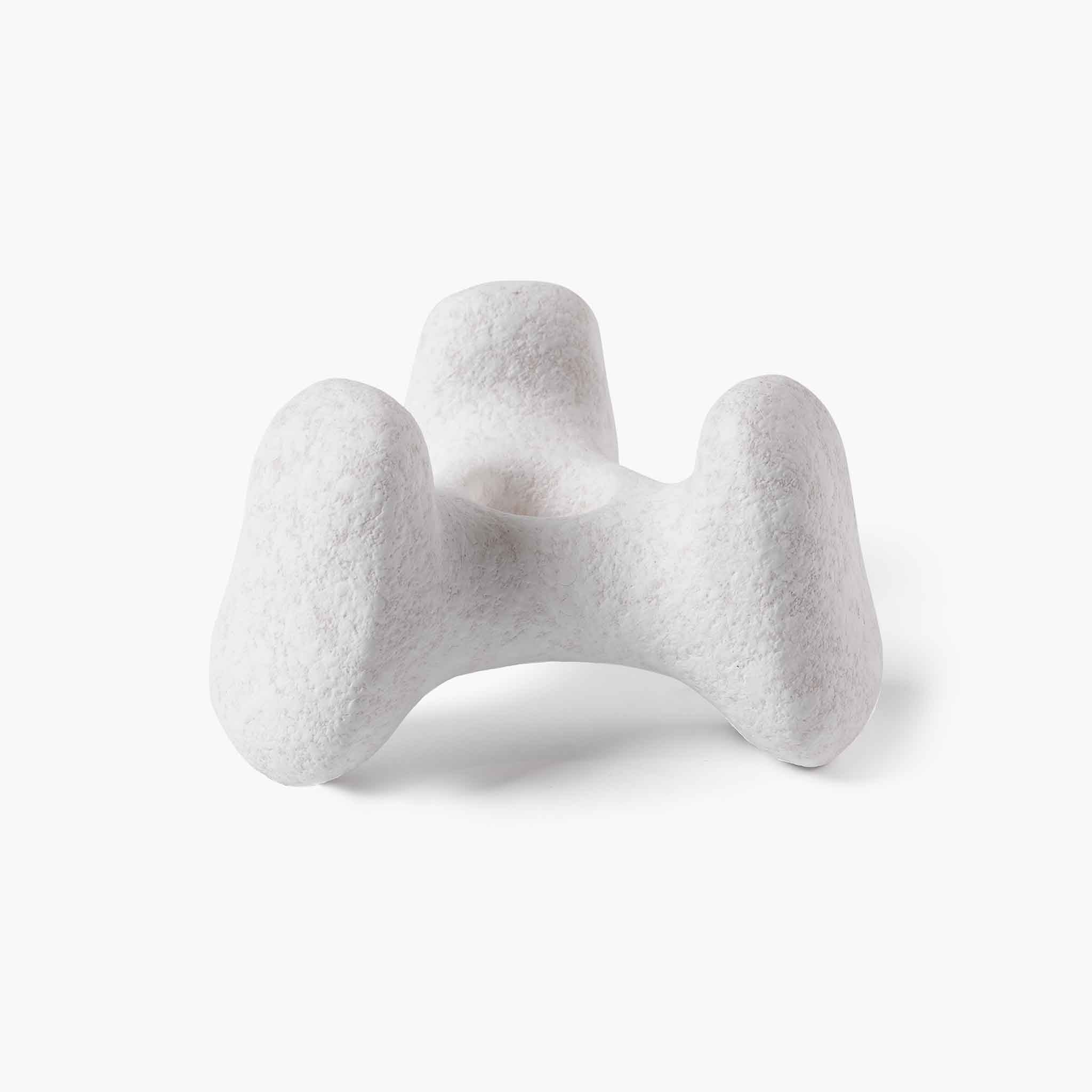 Minimalist sculptural ceramic tray featuring a wabi-sabi tactile finish, an essential art piece for elegant styling.