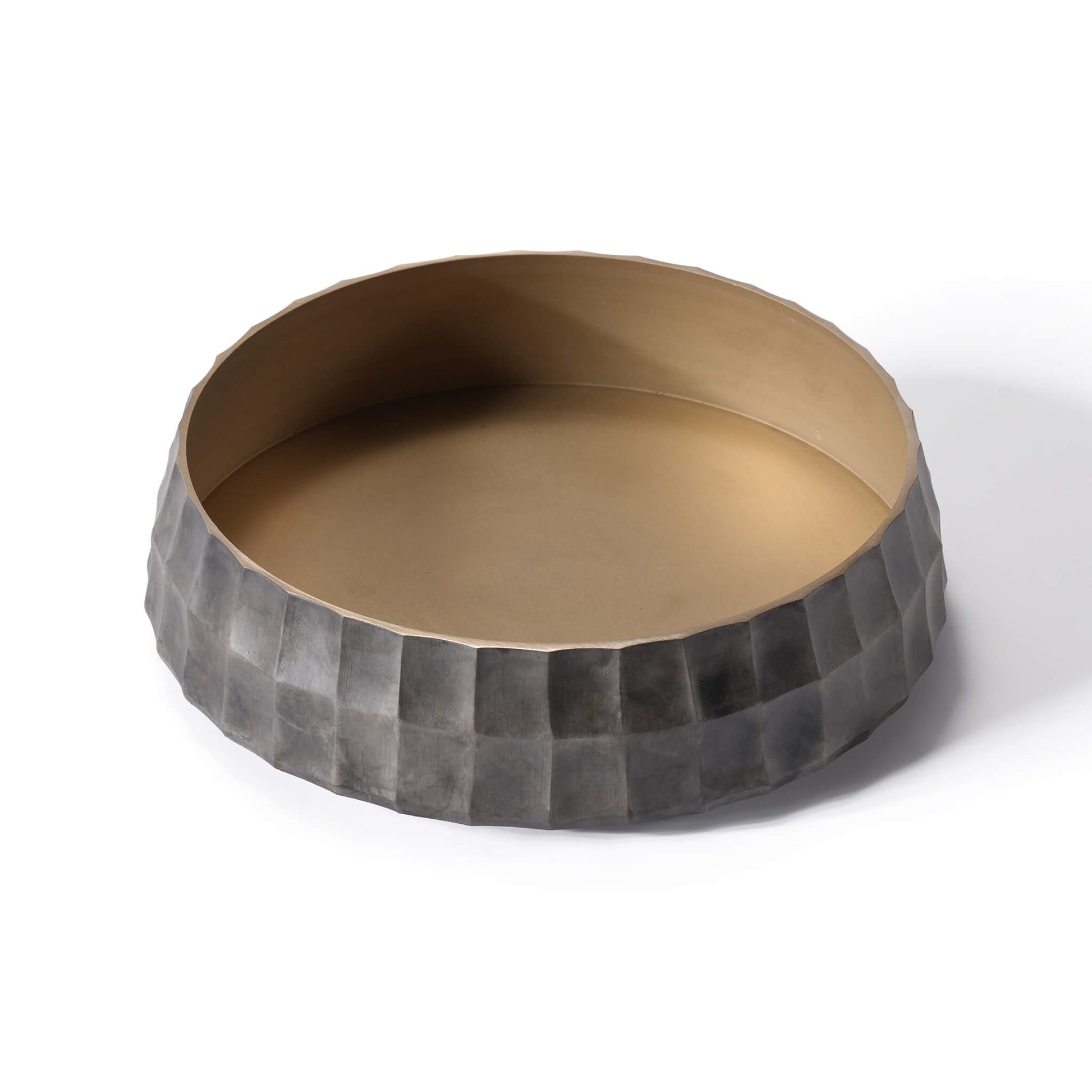Front view of the heavy brass floral vessel showcasing its tapered mouth and smooth golden interior.