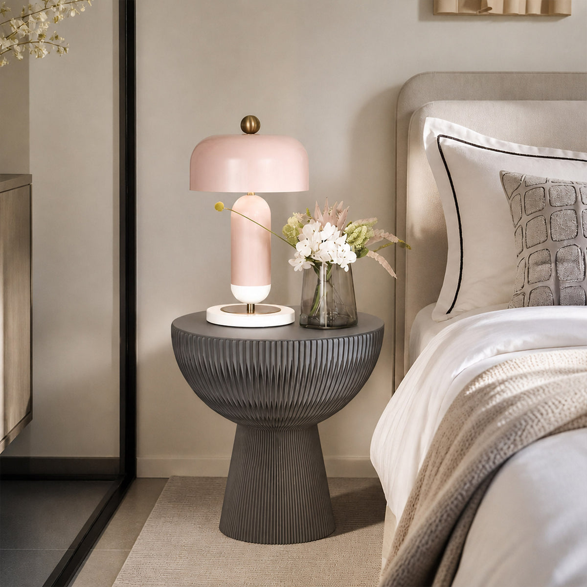 Grey Bouquet Side Table A styled as a bedside table with a pink lamp and flowers.