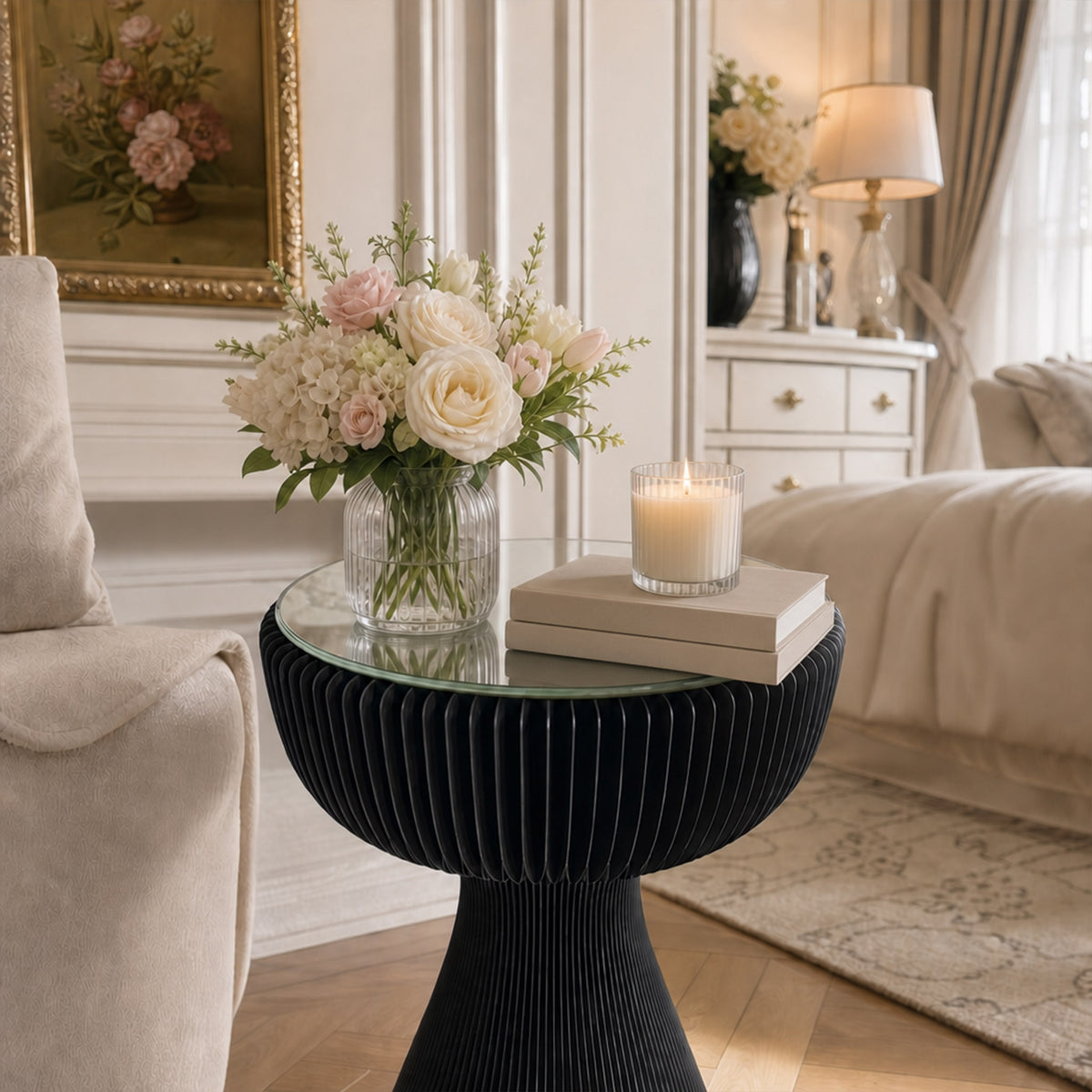 Black Little Black Dress Side Table styled with flowers, books and a candle in an elegant living room