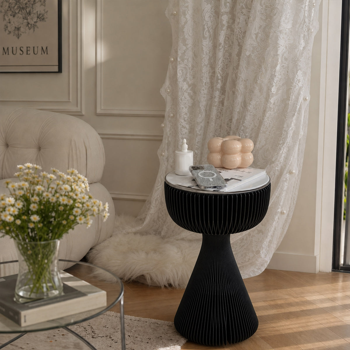 Black Little Black Dress Side Table with glass tabletop styled beside lace curtains in a soft neutral interior
