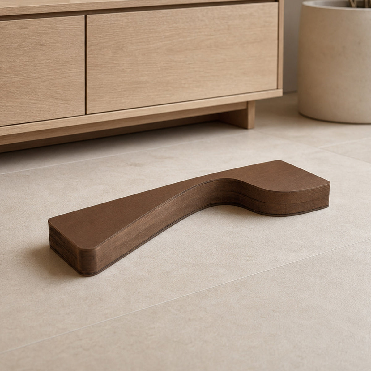 Brown folded honeycomb paper base of the Little Black Dress Side Table shown flat for compact storage