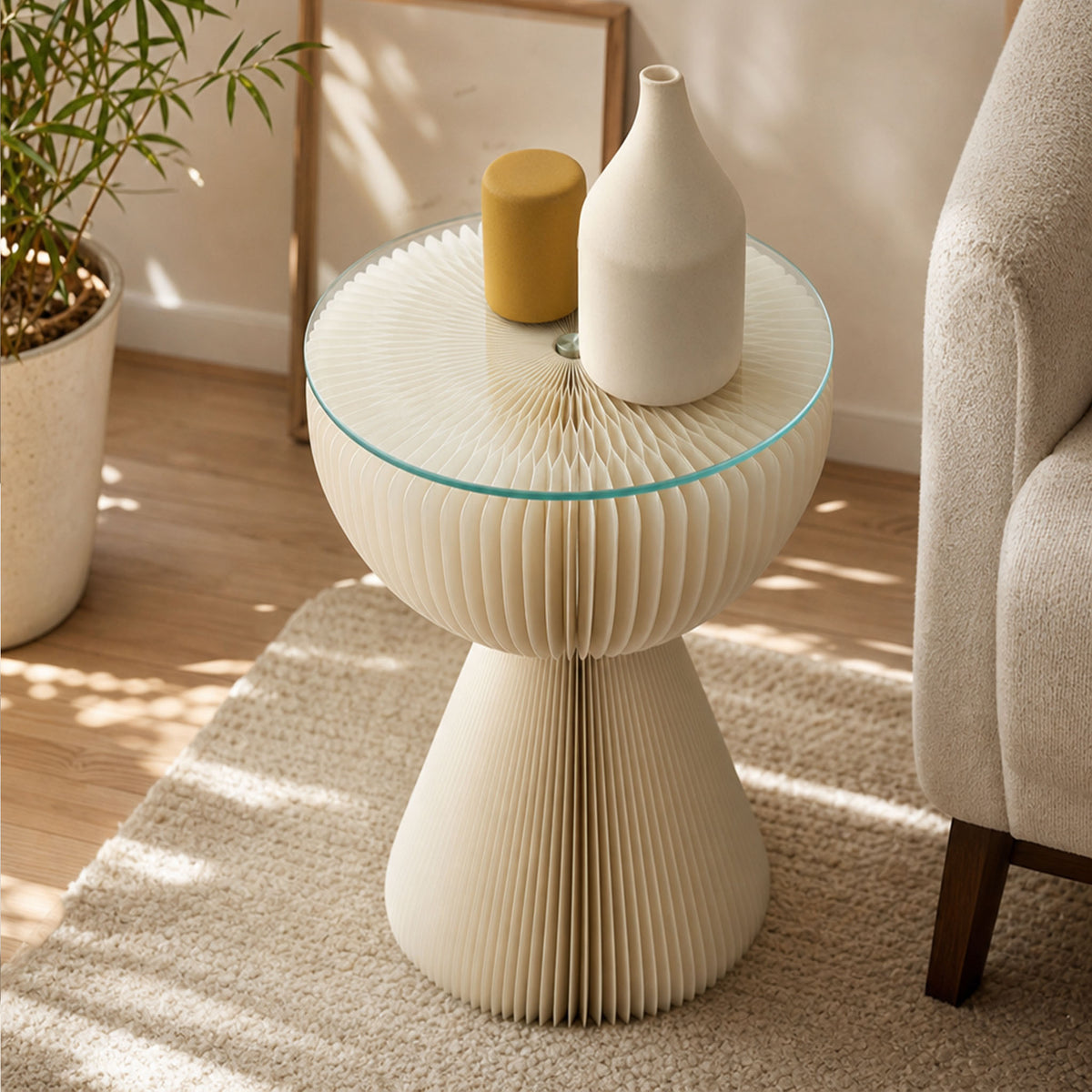 Close view of the white Little Black Dress Side Table showing its tempered glass top and folded honeycomb paper structure