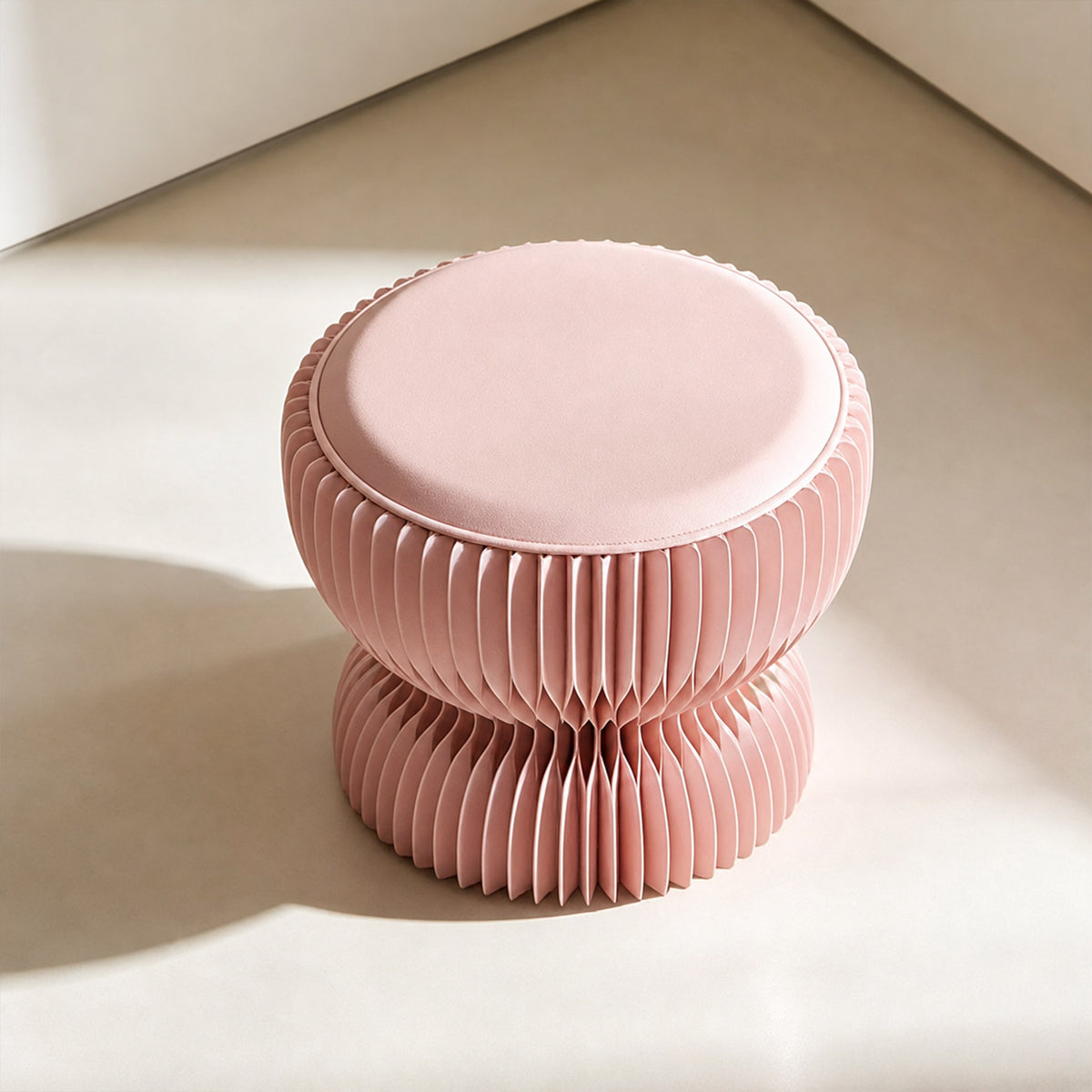 Angled top view of the pink LOTUS Stool A highlighting the removable PU leather cushion and rounded paper structure