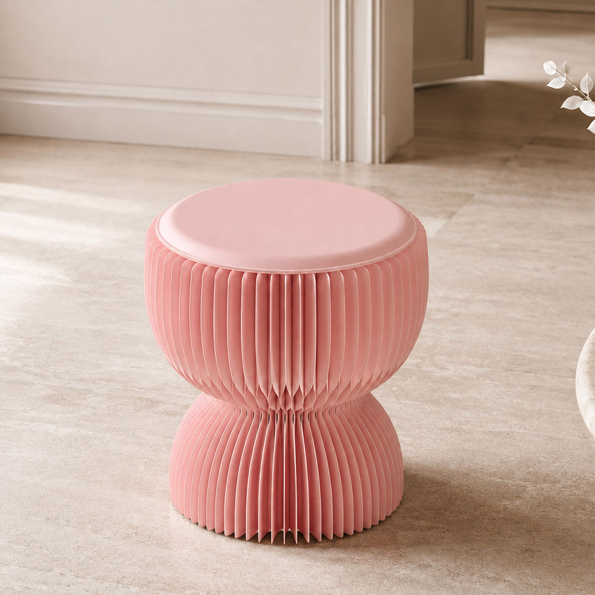Angled top view of the pink LOTUS Stool B showing the rounded PU leather cushion and lotus-inspired silhouette
