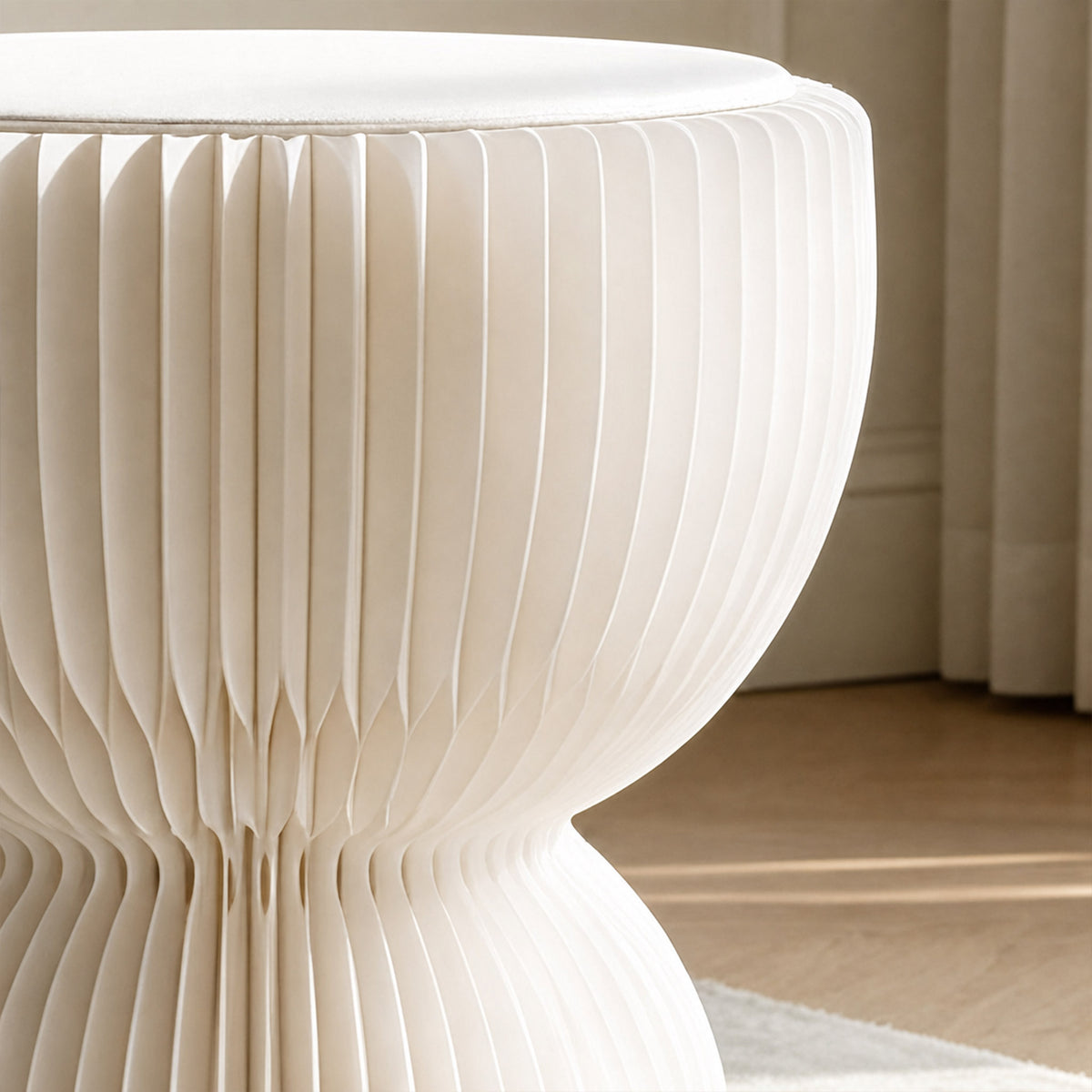 Close-up of the white LOTUS Stool B highlighting the PU leather cushion and curved honeycomb paper body