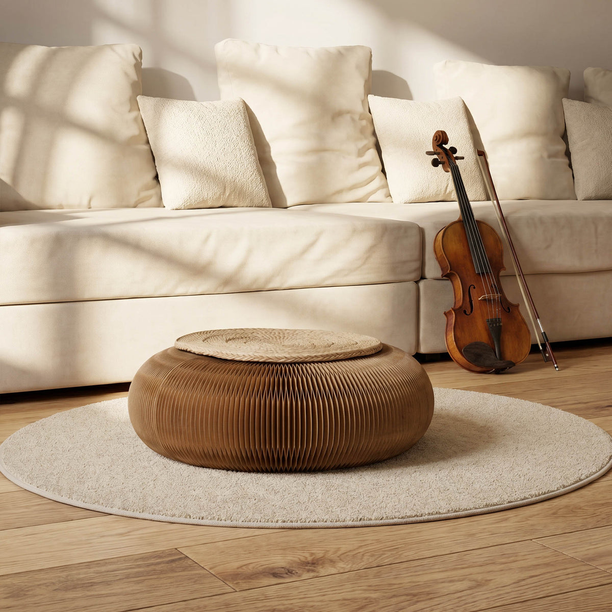 Brown Meditation Cushion with rush grass cushion used as low floor seating beside a cream sofa and violin