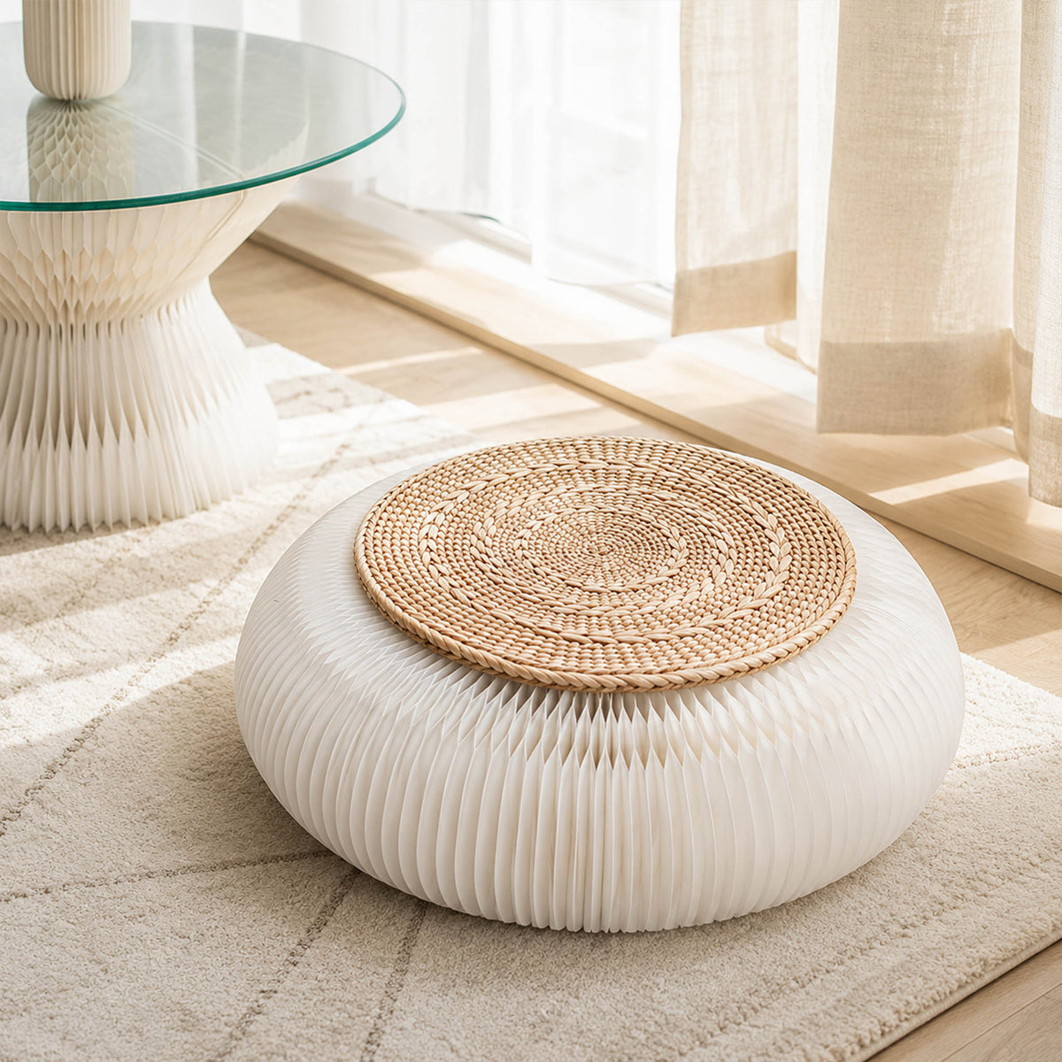 White Meditation Cushion with honeycomb paper structure and rush grass cushion styled beside a bright window
