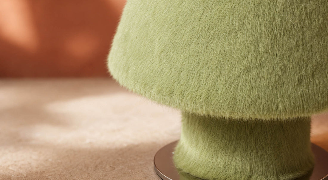 The classic silhouette of the ARTAMORE 36.5°C table lamp seamlessly integrated with a modern plush exterior.